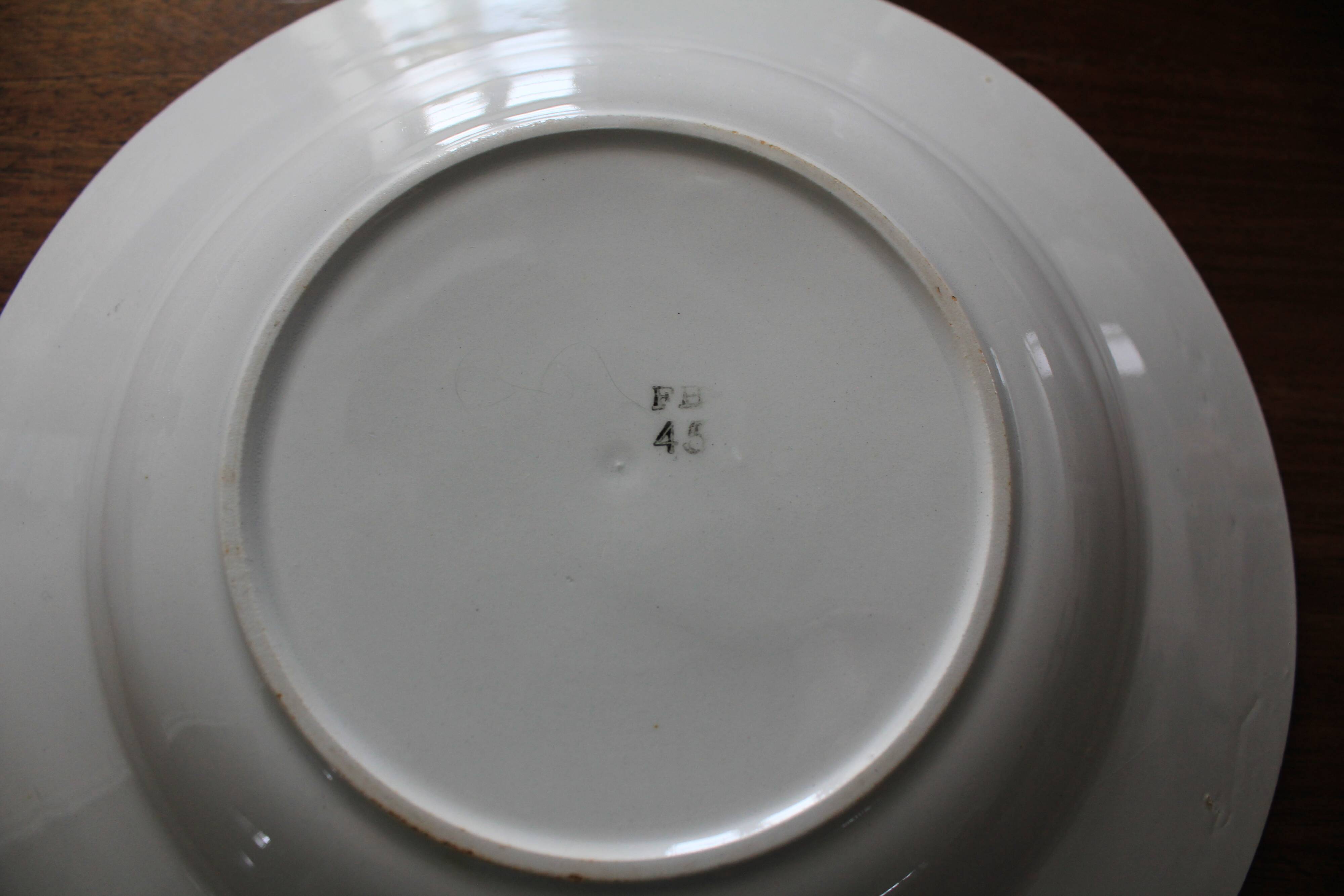 Deep plate with royal blue geometric pattern marked on the back FB 45.