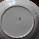 Deep plate with royal blue geometric pattern marked on the back FB 45.