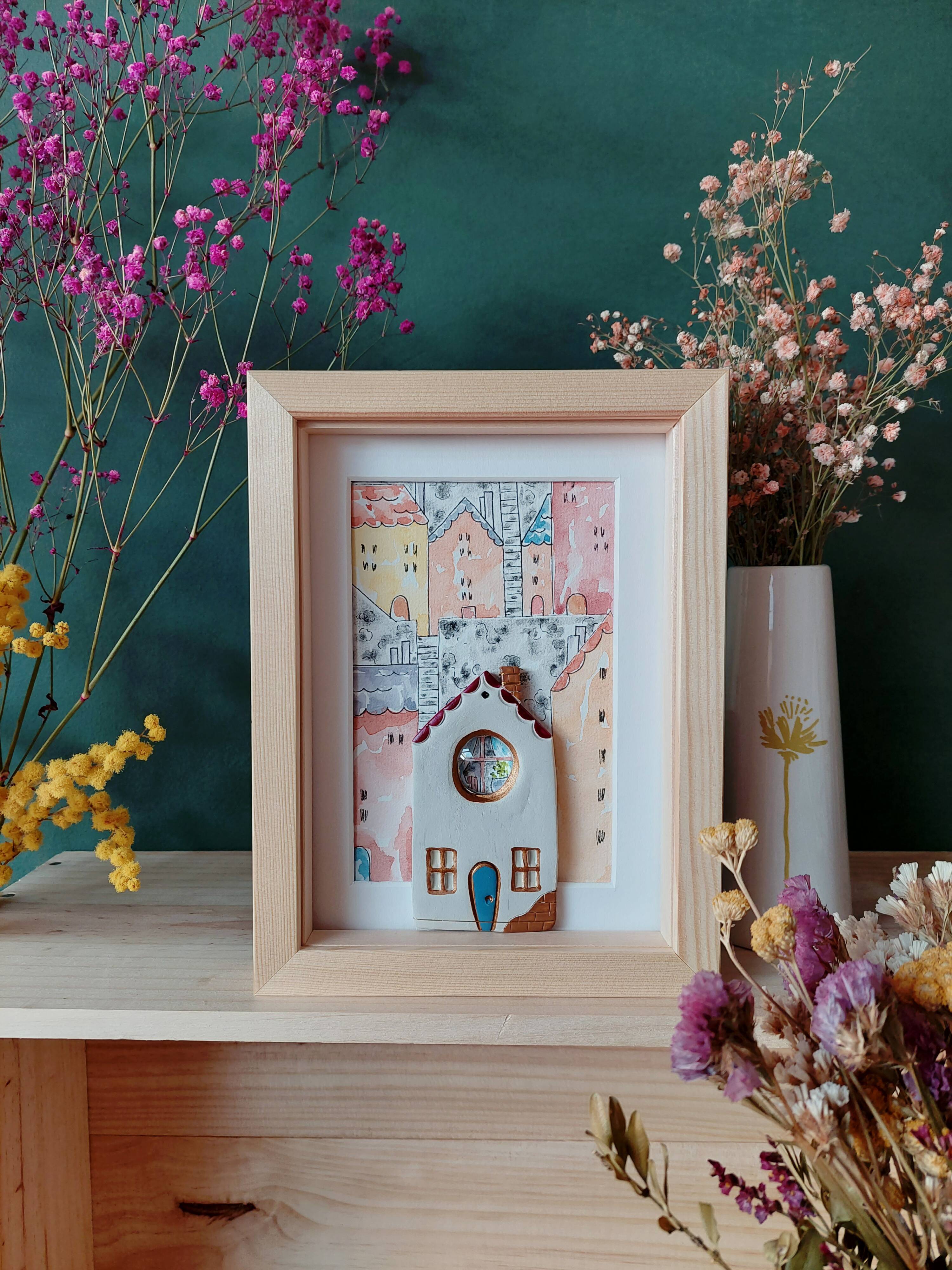 Relief composition of a city landscape inspired by old Lyon