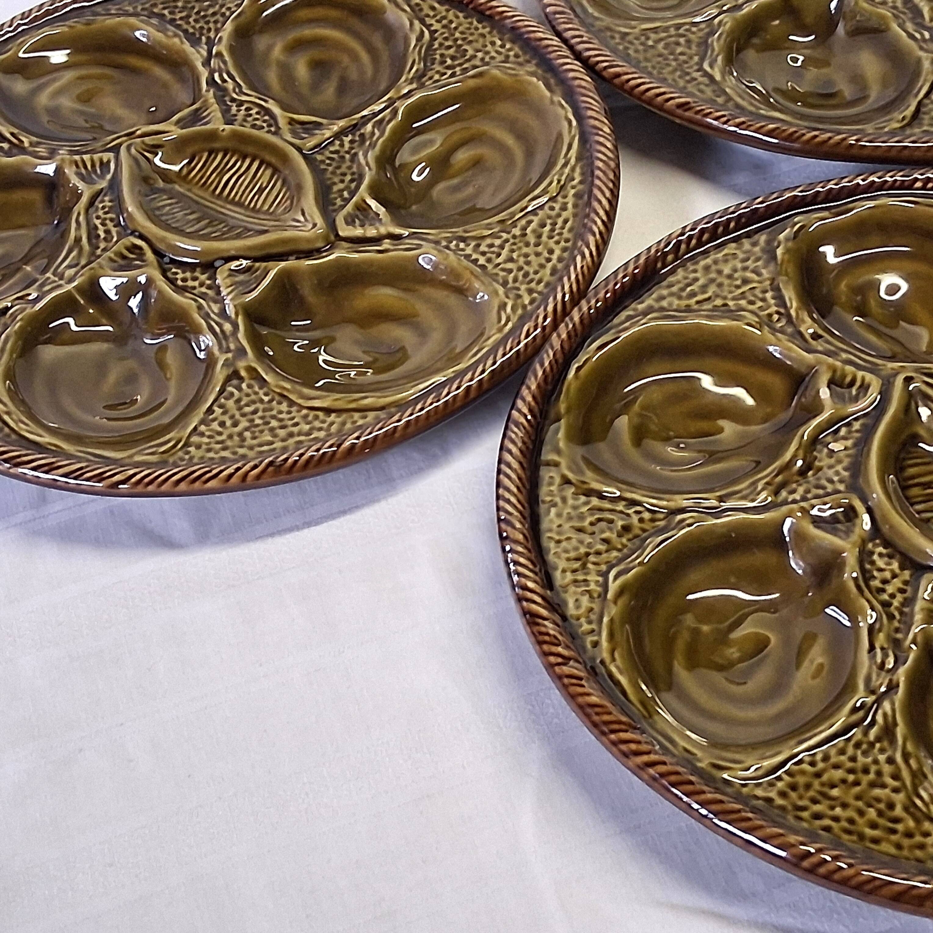 3 green majolica oyster plates from St Clément in good condition.