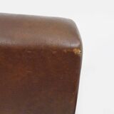 Pair of Scandinavian armchairs in brown leatherette and wood from the 50s and 60s
