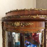 Louis XV style rounded showcase