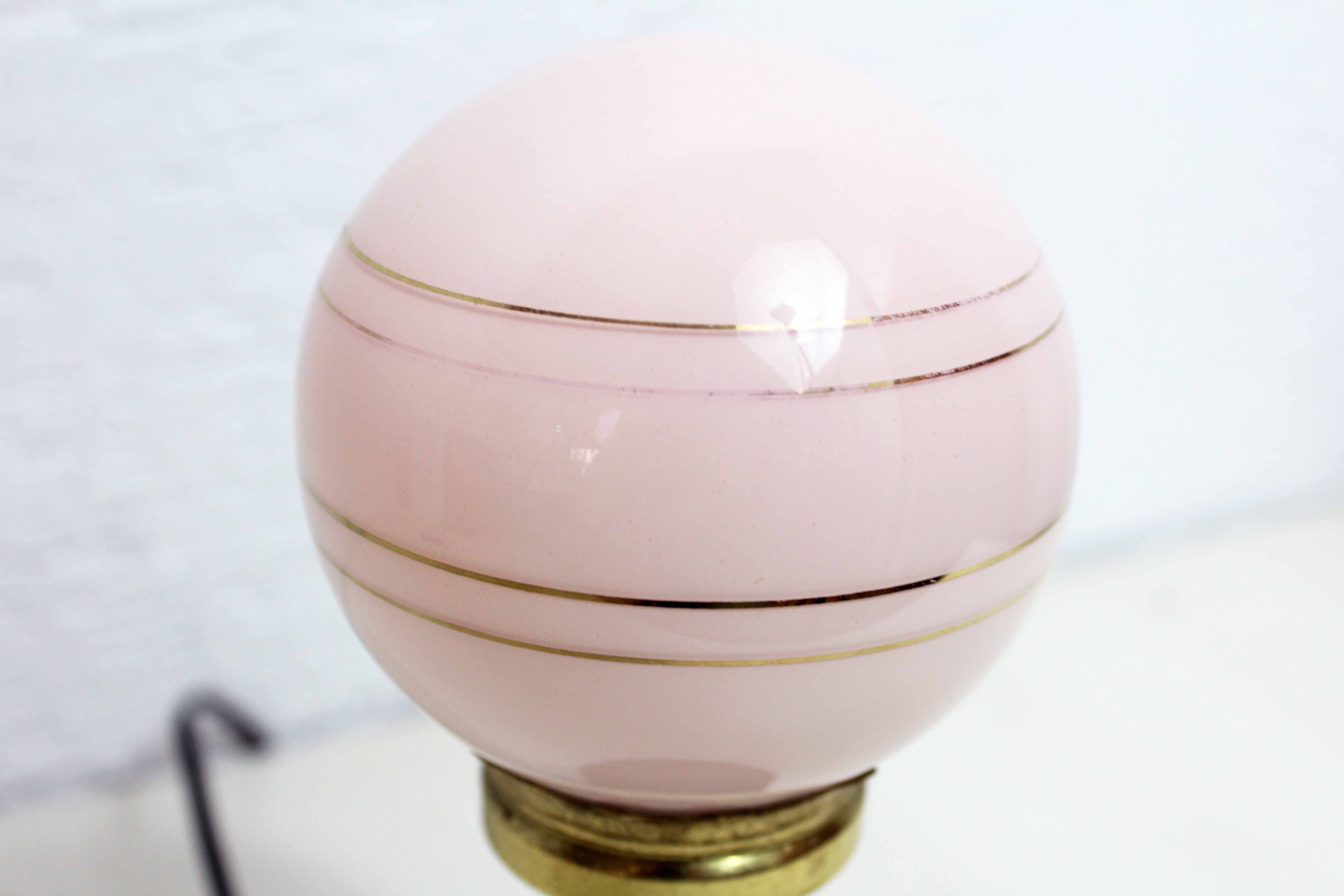 Teak table lamp and pink glass