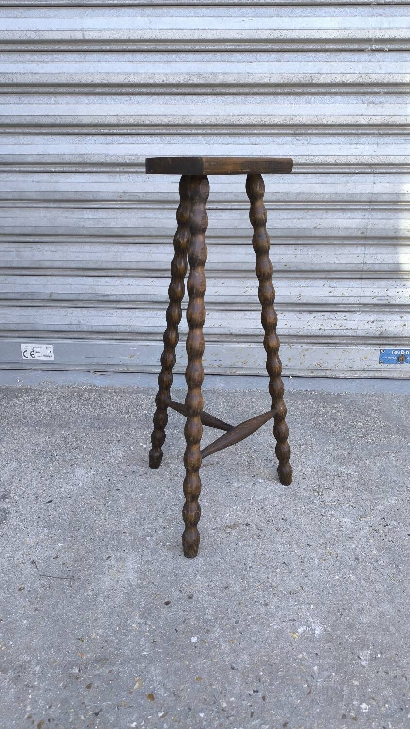 Turned wooden tripod stool