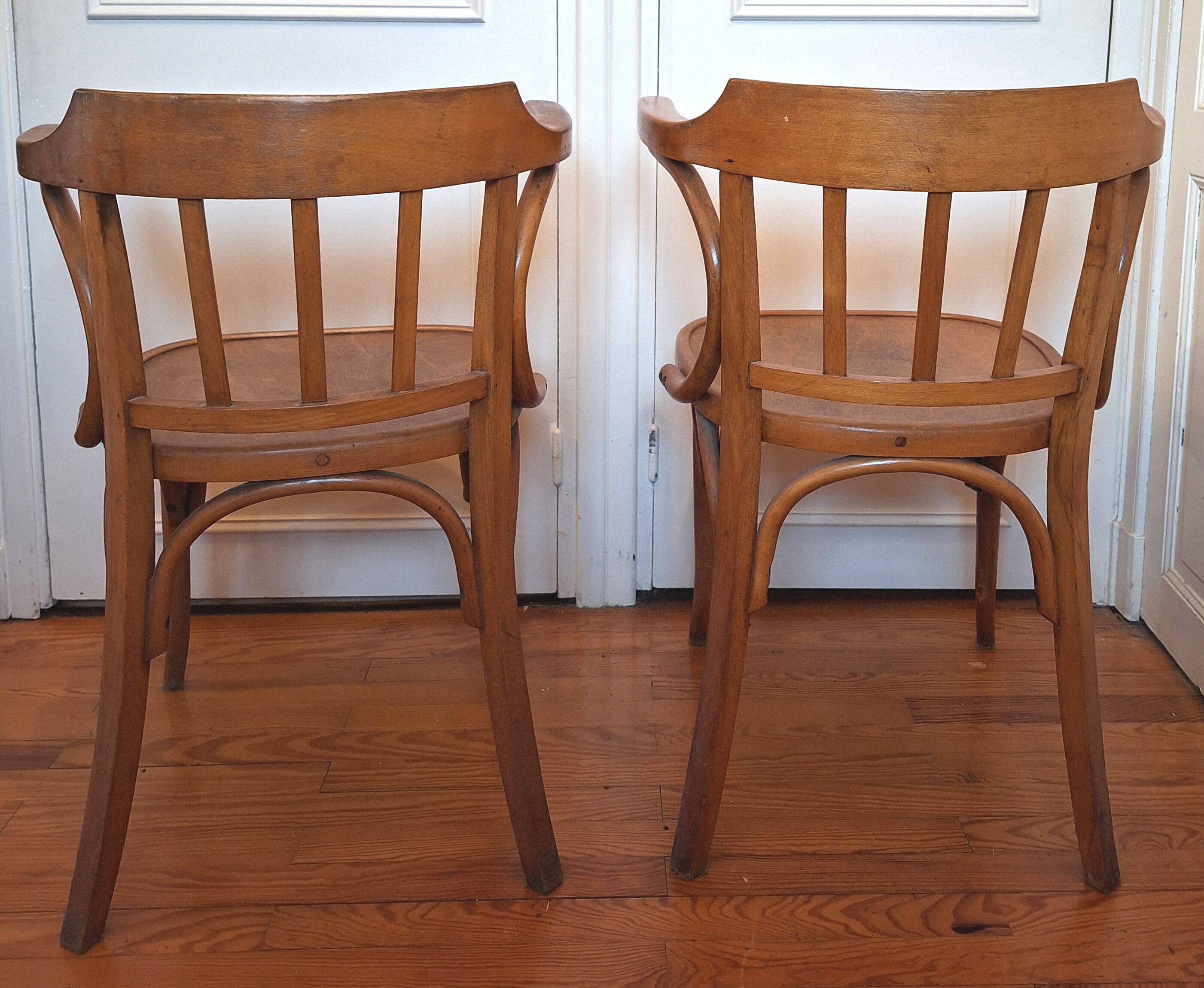 Curved wooden armchair