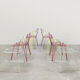 Vintage multicolor stackable wire chairs