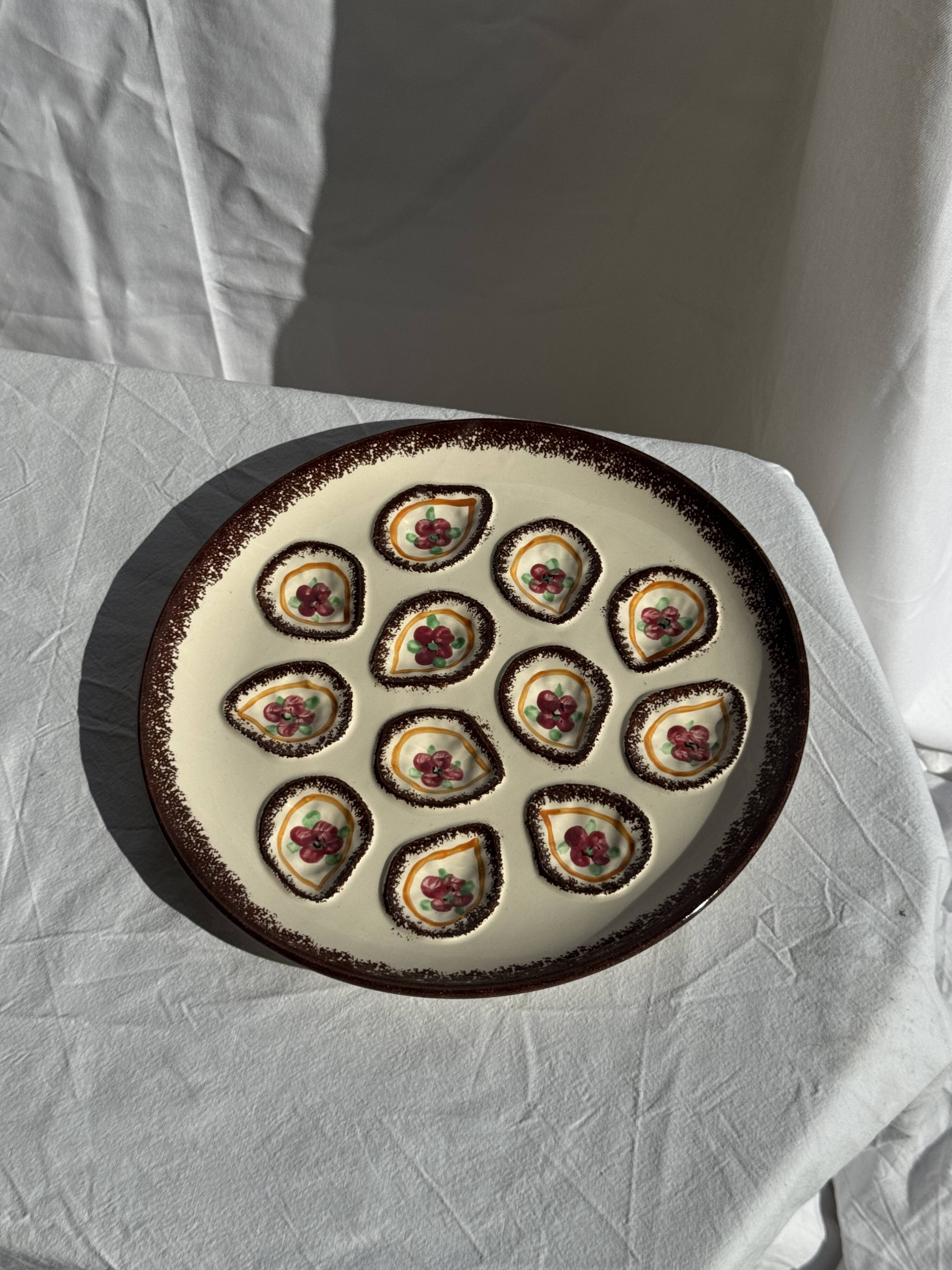 Large circular platter with compartments for shellfish, molluscs, and oysters.