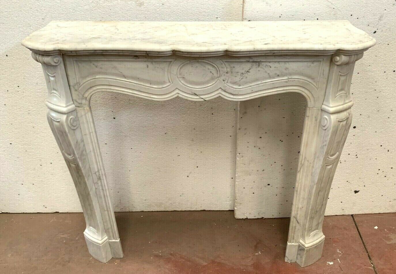 Louis XV style fireplace in white marble veined Carrara Italy 20th century