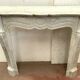 Louis XV style fireplace in white marble veined Carrara Italy 20th century