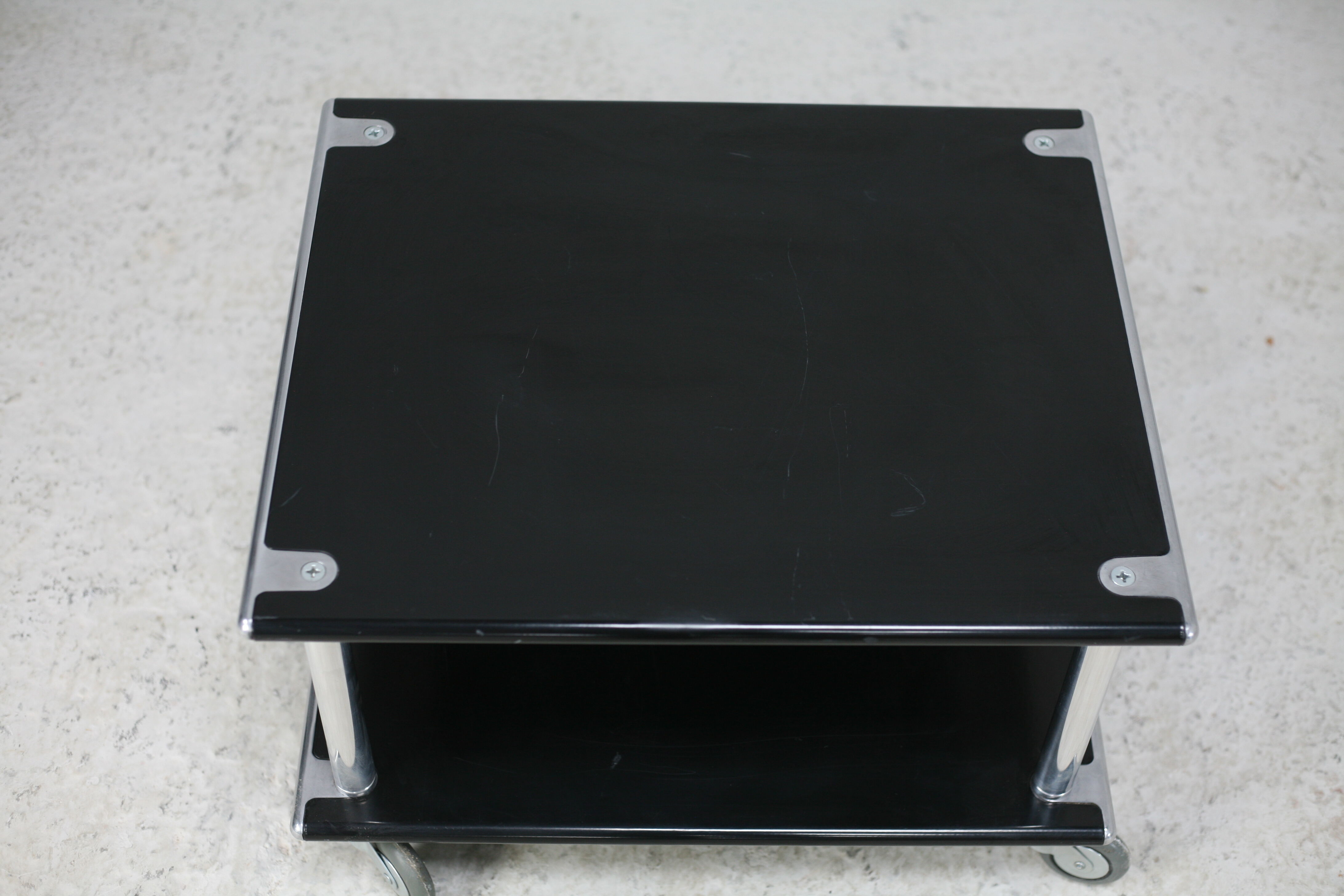 Coffee table "space age" in black lacquered steel