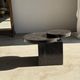 Brown petrified wood coffee table from Indonesia with a double circular top.