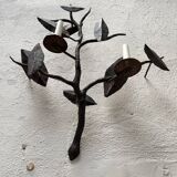 Wall lamp in wrought iron.