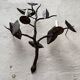 Wall lamp in wrought iron.
