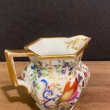 Old Paris porcelain milk jug with polychrome and gold bird floral decoration