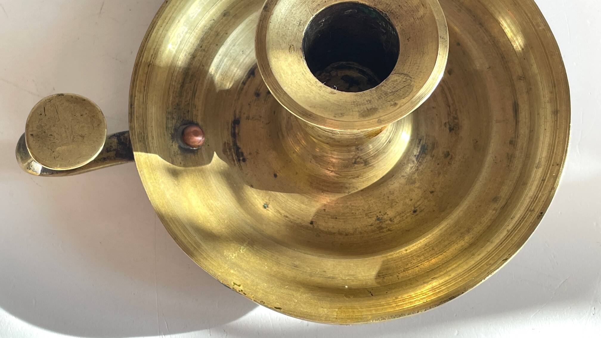 Antique solid bronze hand candlestick