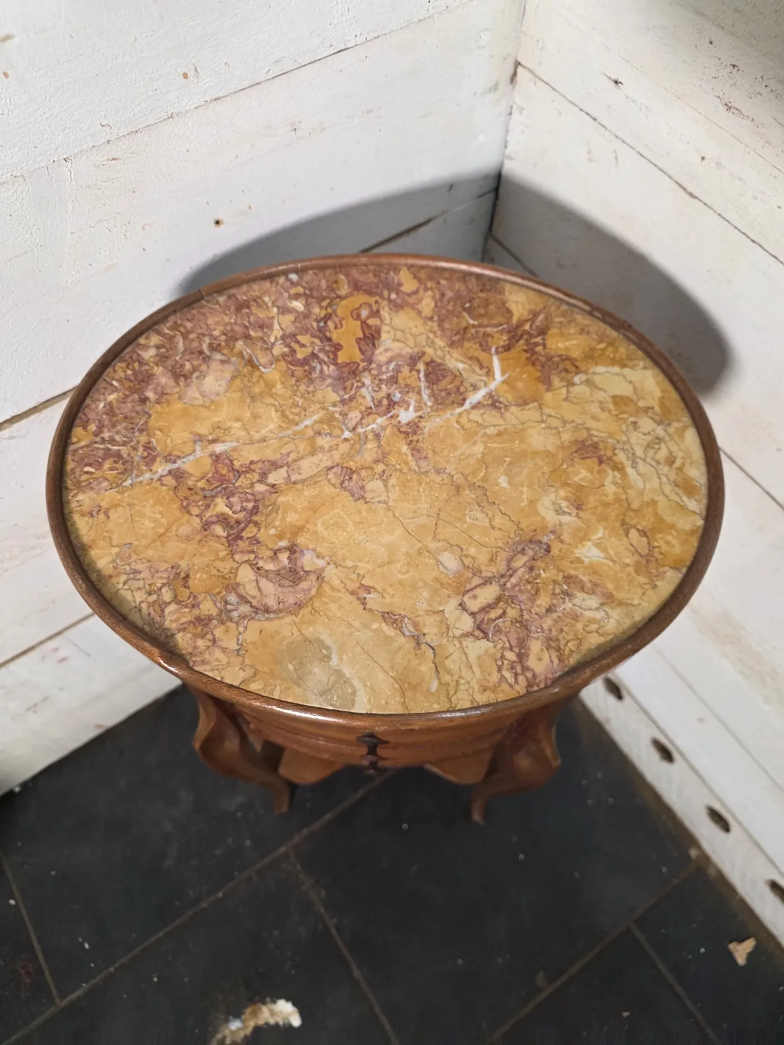 Oval bedside table in Louis XV style made of mahogany.