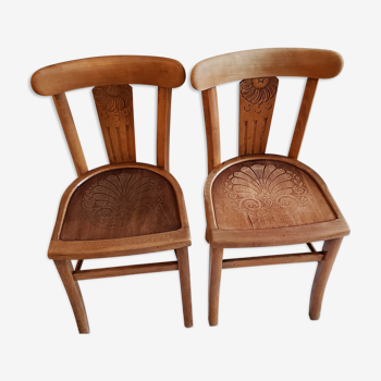 2 wooden bistro chairs engraved seat