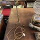 Rare articulated tripod base table lamp in gold-plated brass