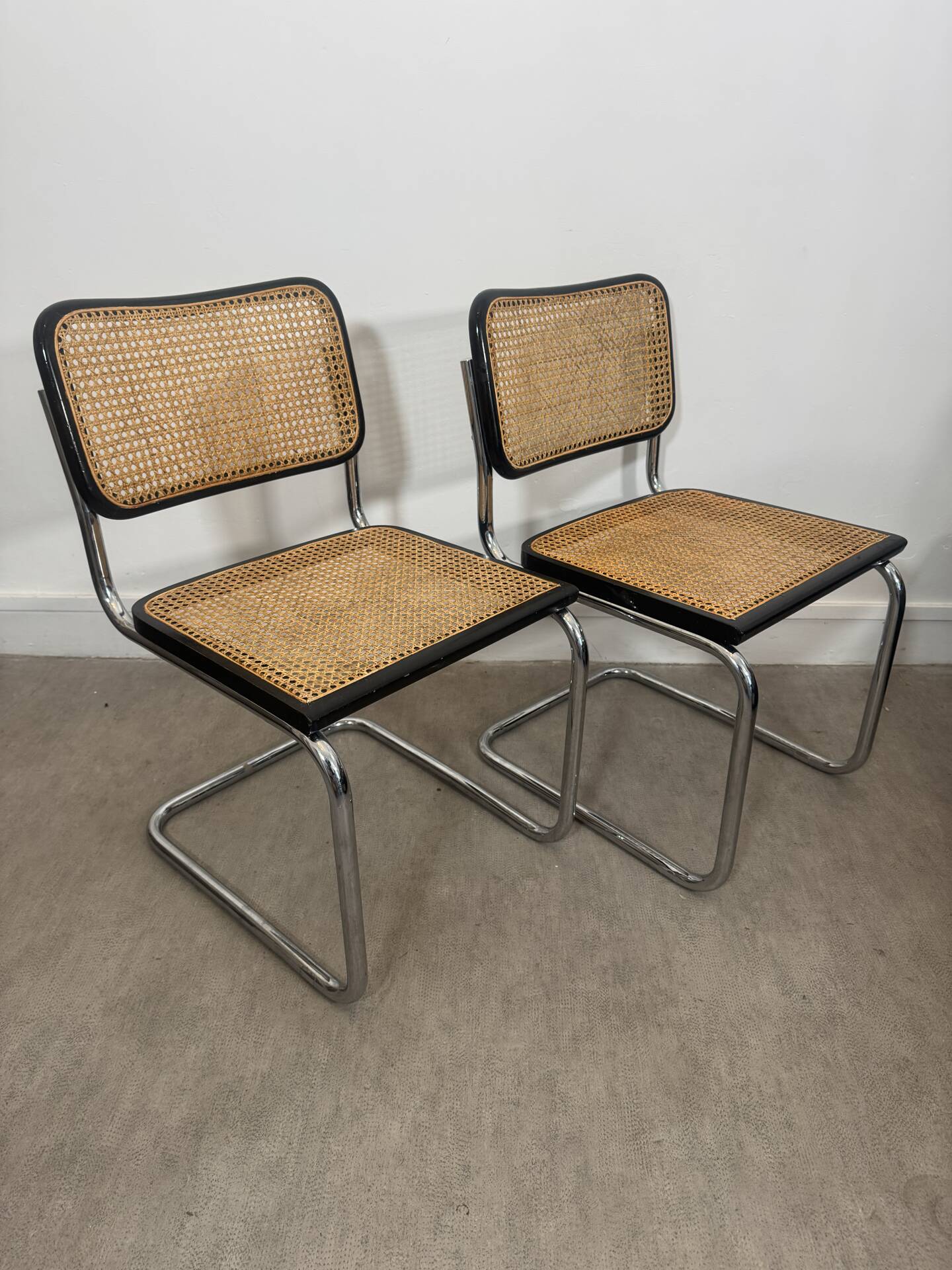 Pair of Marcel Breuer B32 Cesca chairs made in Italy.