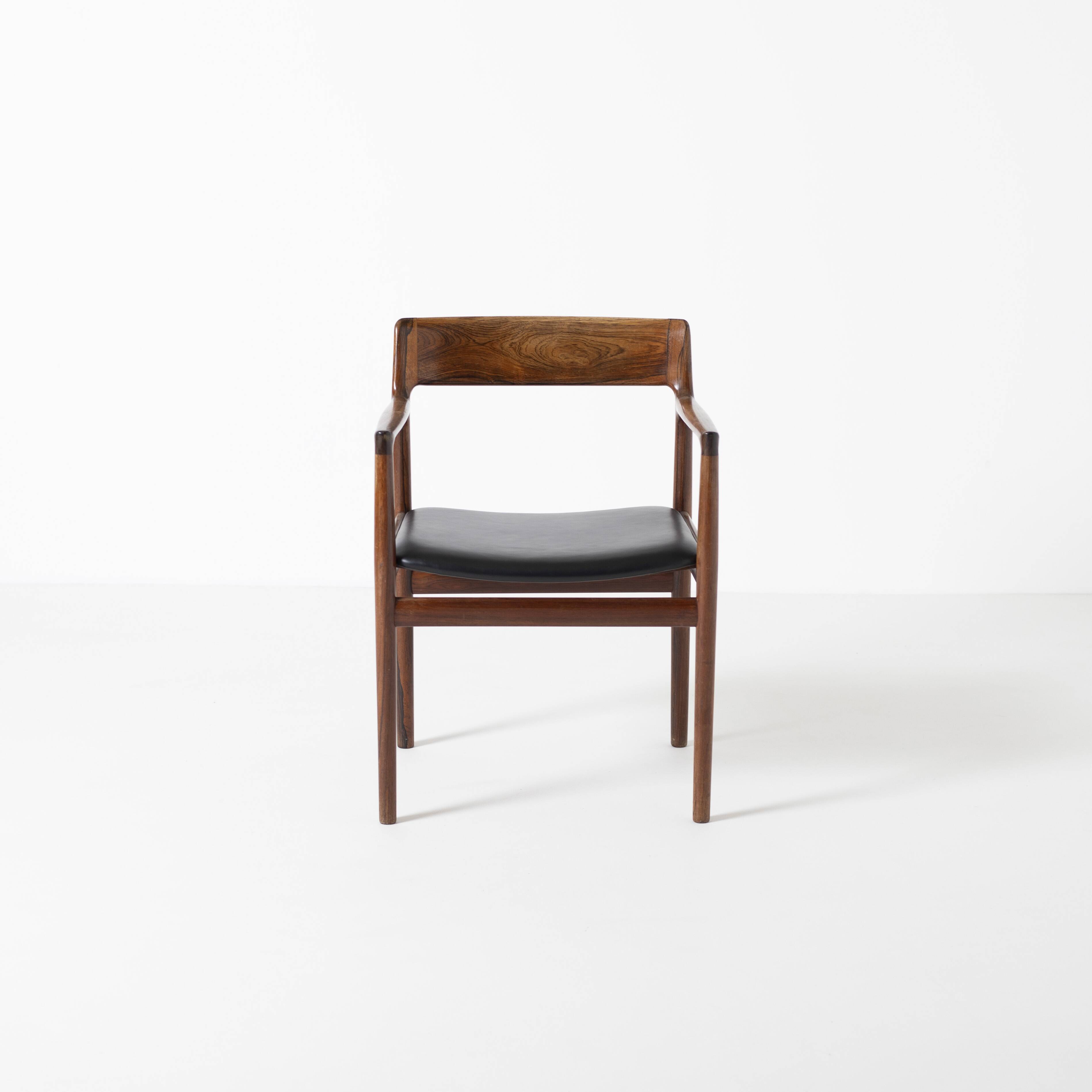 Armchair in rosewood and black leather, by J. Norgaard, Denmark, 1960s