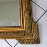 Mirror with gilded wood and stucco frame, early 20th century, 59x83cm