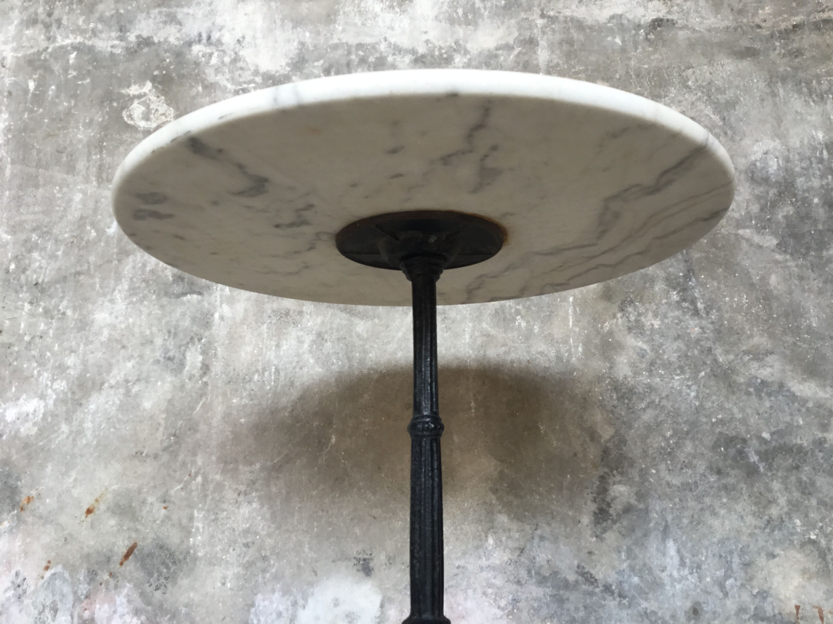 Round marble bistro table and cast iron base