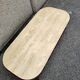 Coffee table Travertine top, garnet-colored metal stand and legs.  Long