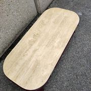 Coffee table Travertine top, garnet-colored metal stand and legs.  Long