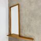 Scandinavian mirror with asymmetrical shelf in wood, 1960s