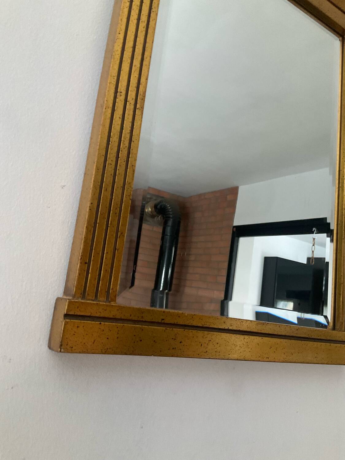 Vintage Deknudt Empire style mirror in gilded wood