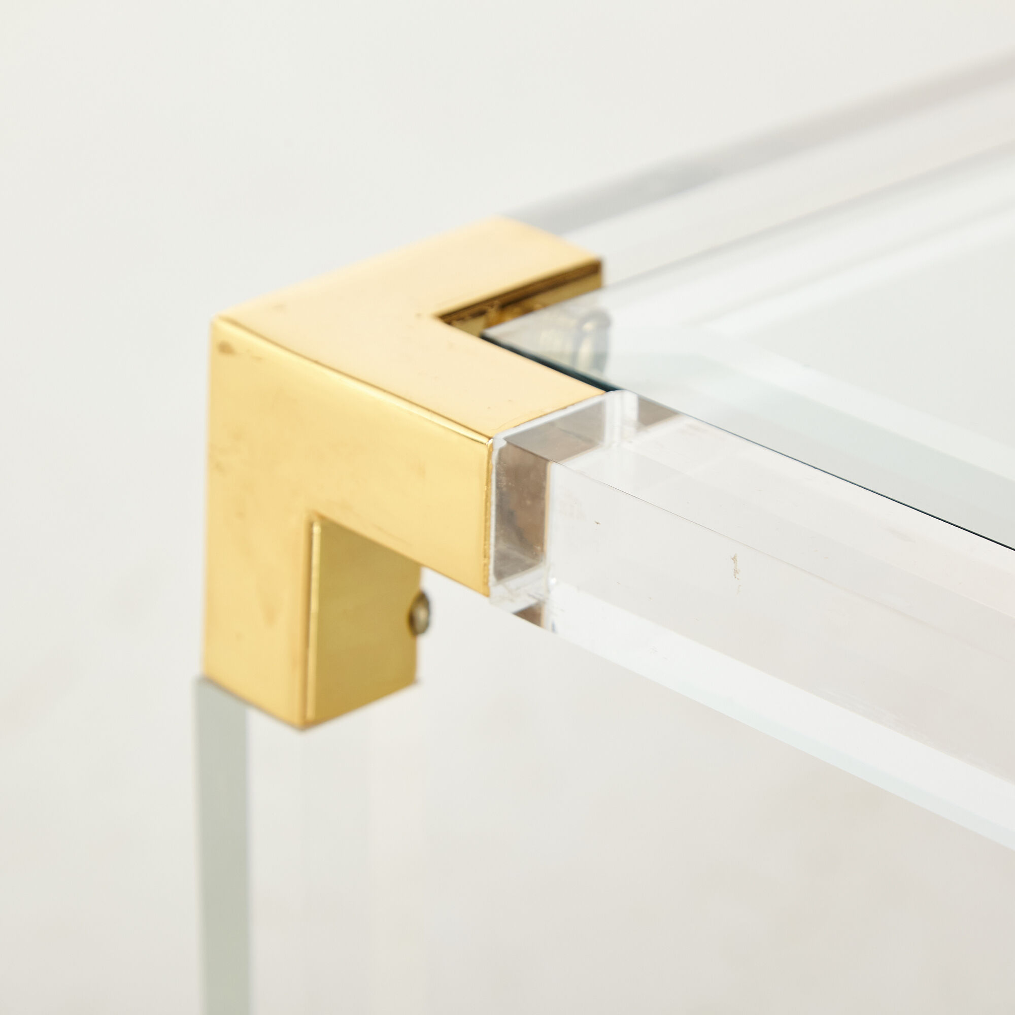 Glass and brass coffee table