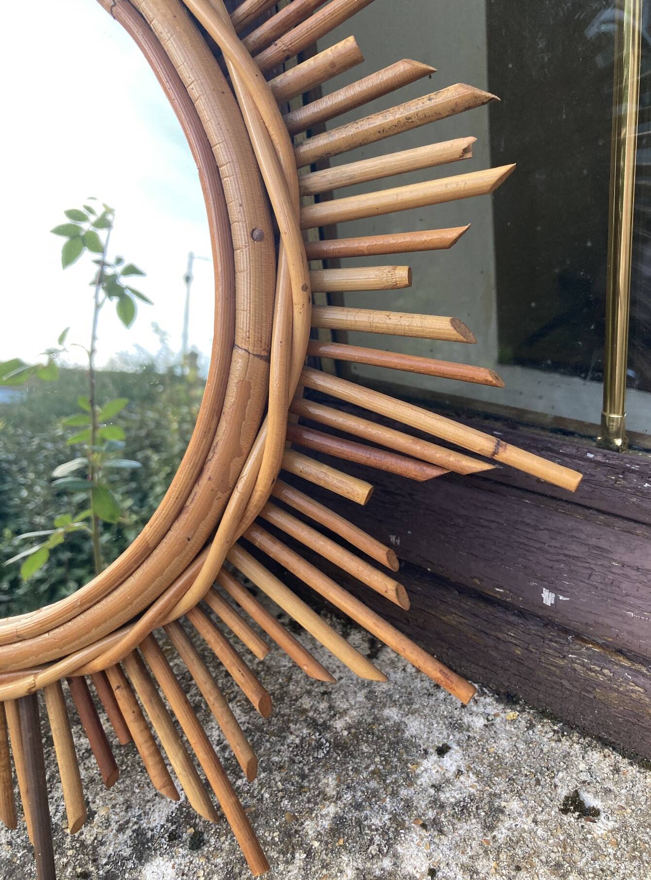 Vintage rattan sun mirror
