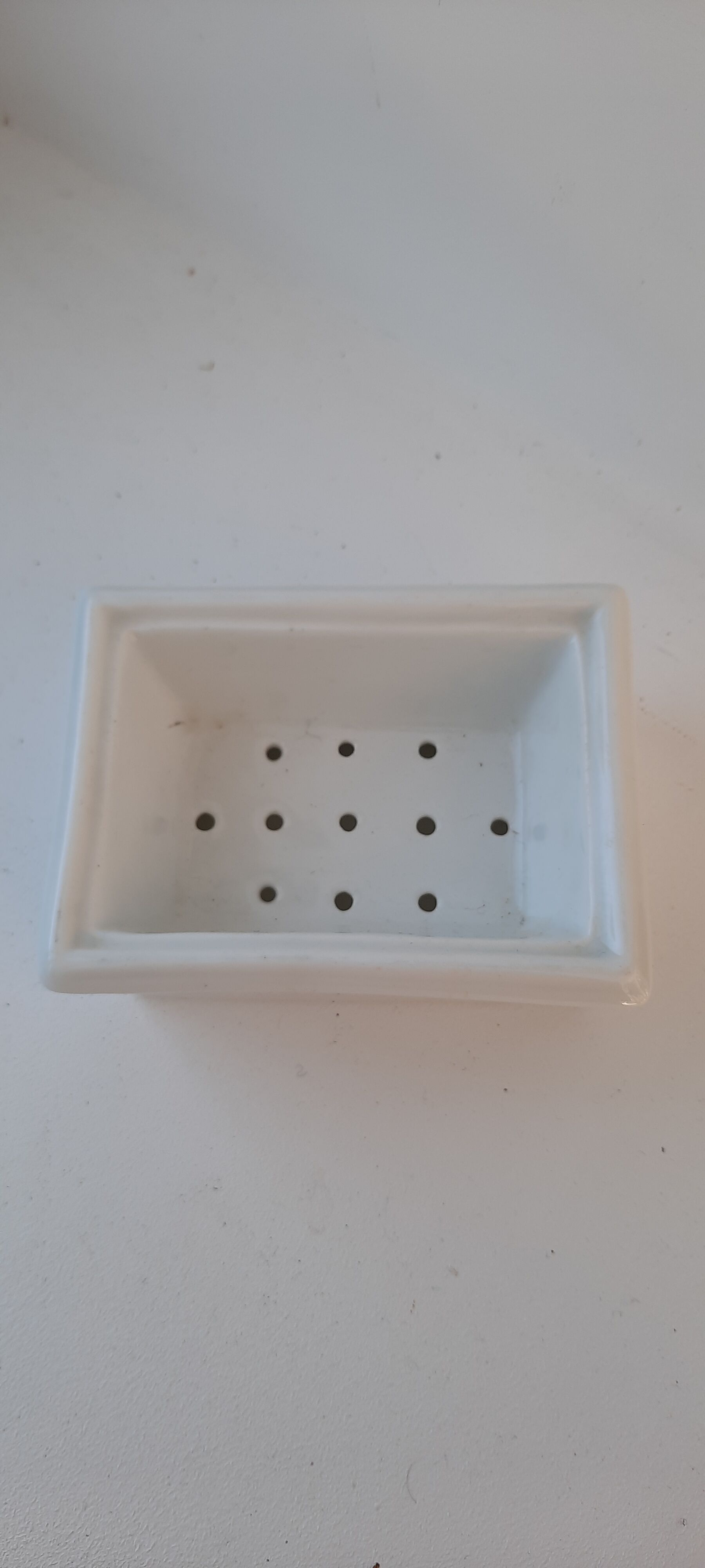 Old white porcelain soap dish