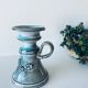 Enamelled ceramic candle holder