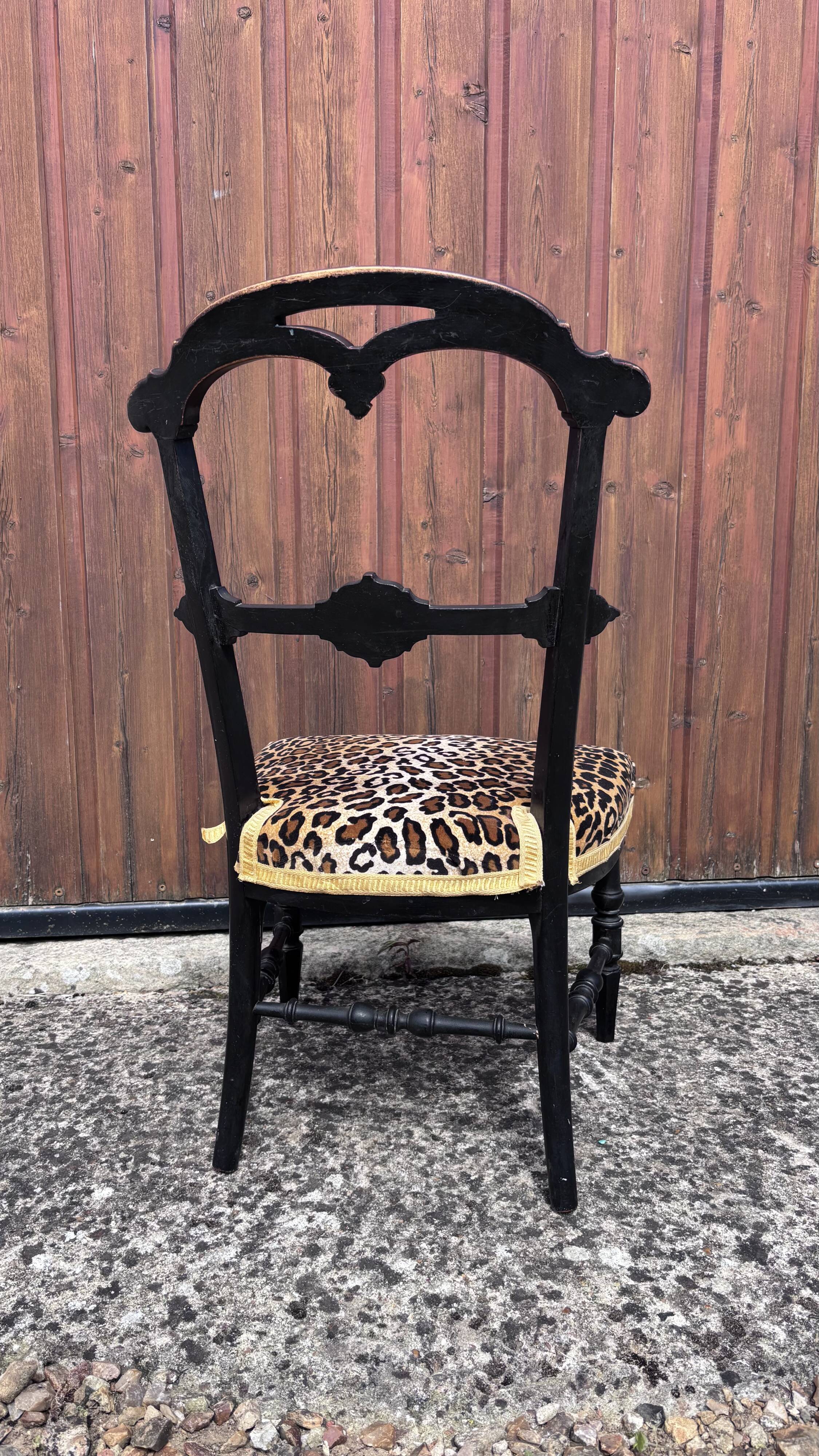 Napoleon III chair reinterpreted – Leopard seat & patinated black wood