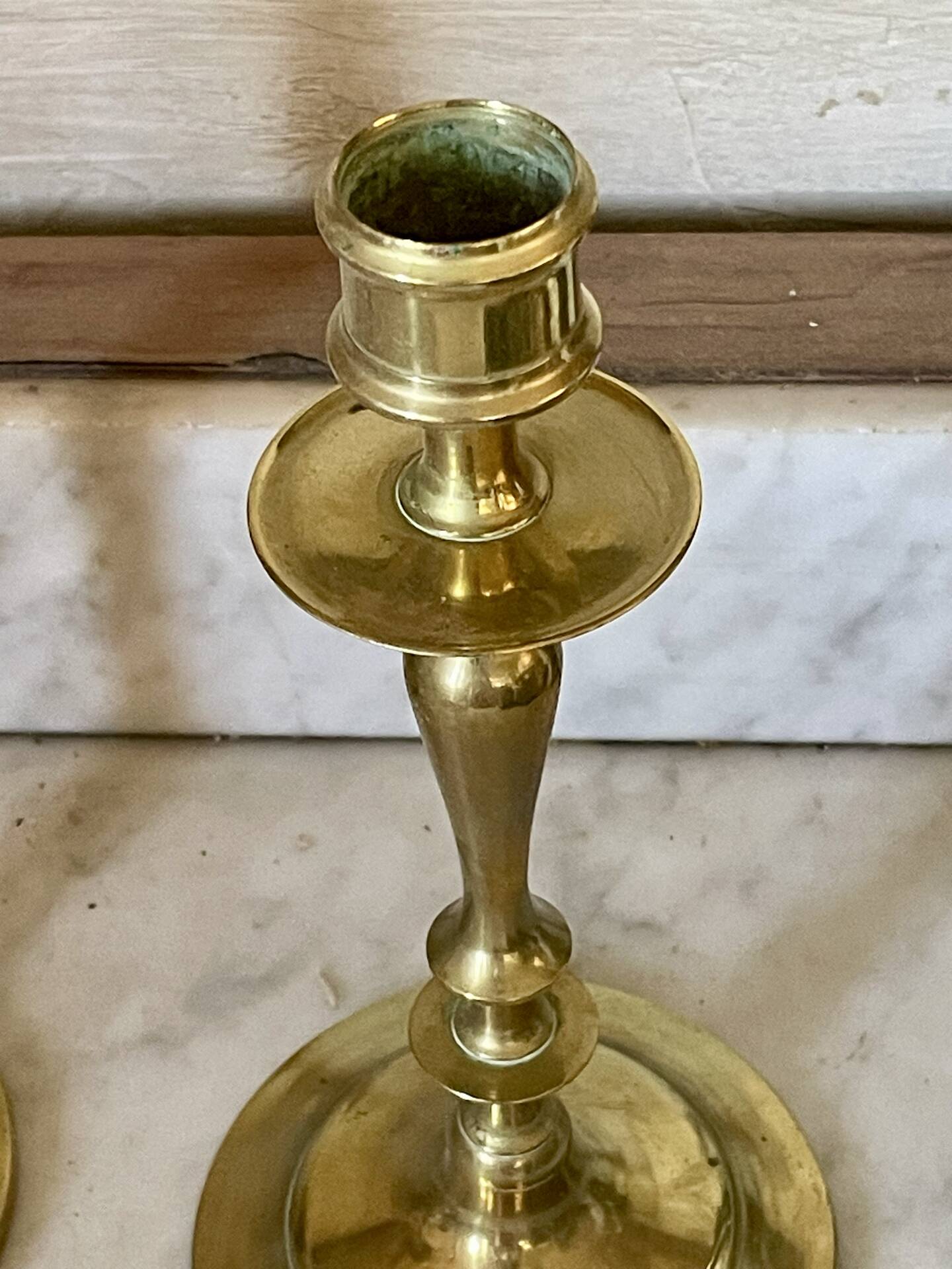Old pair of turned brass candlesticks