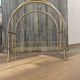 Vintage 1970s brass magazine rack, Mid-Century openwork architectural style.