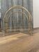 Vintage 1970s brass magazine rack, Mid-Century openwork architectural style.