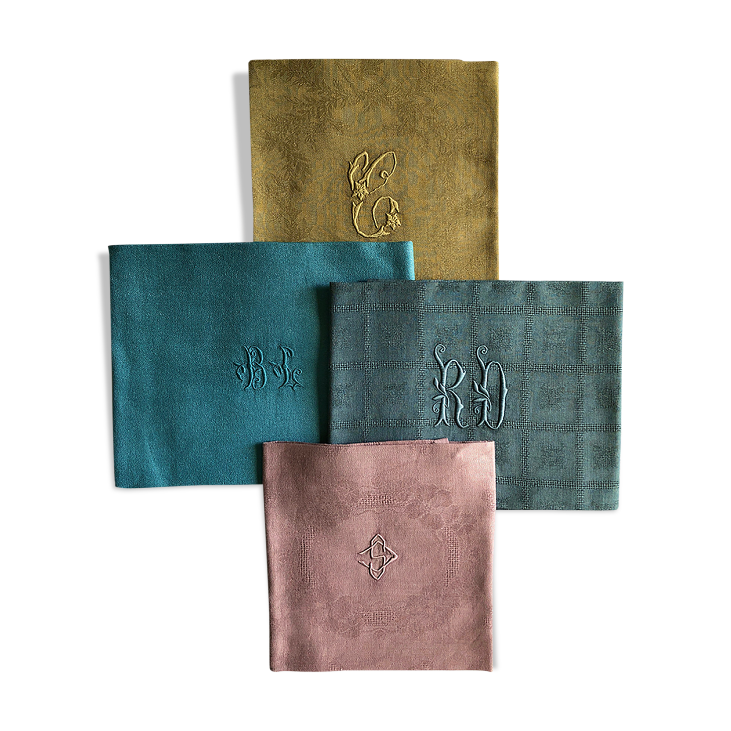 Suite of four tinted antique napkins