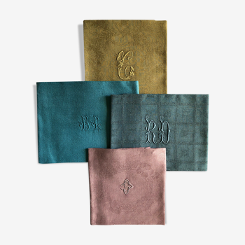 Suite of four tinted antique napkins