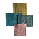 Suite of four tinted antique napkins