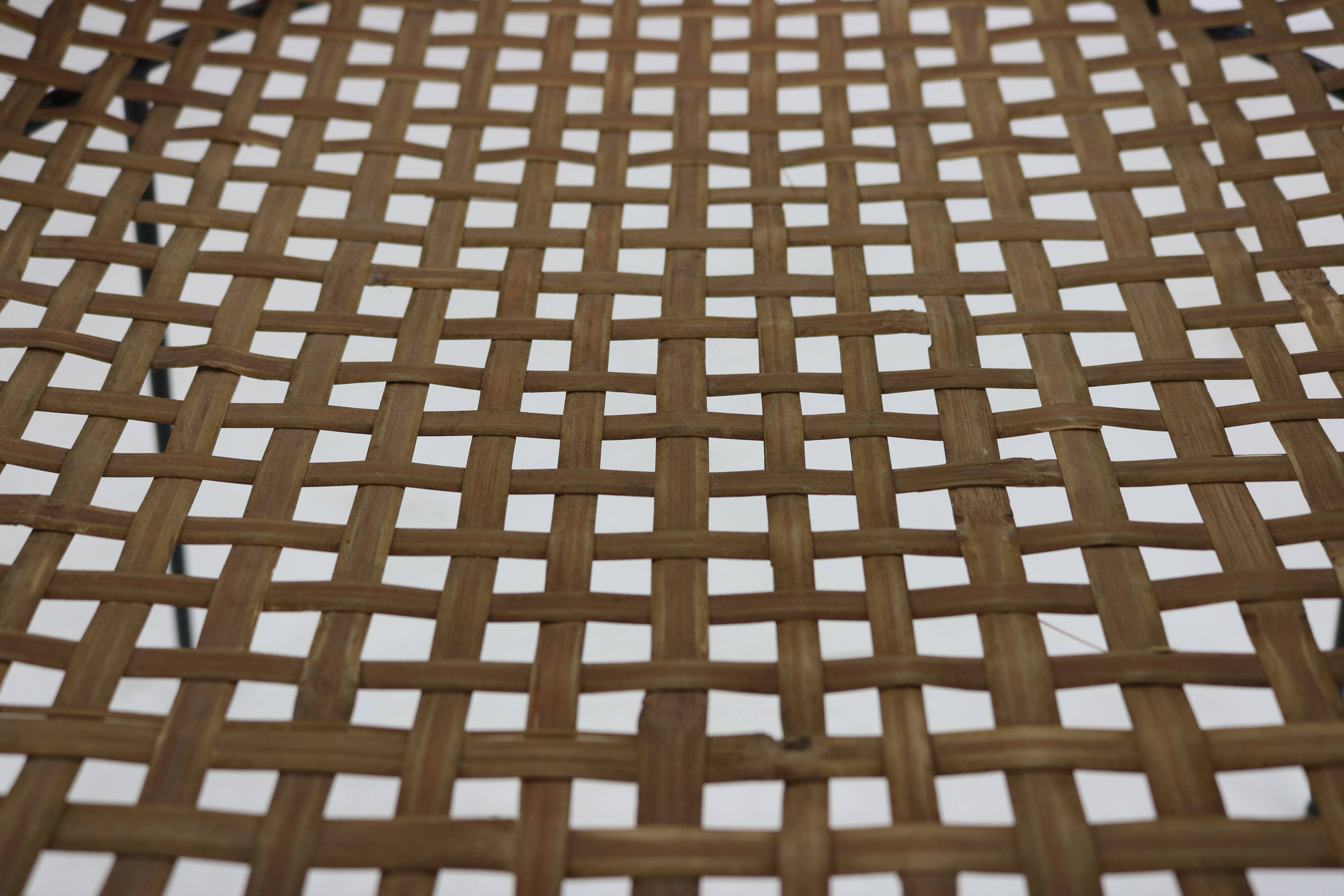 Dutch design rattan / rush tripod magazine side table