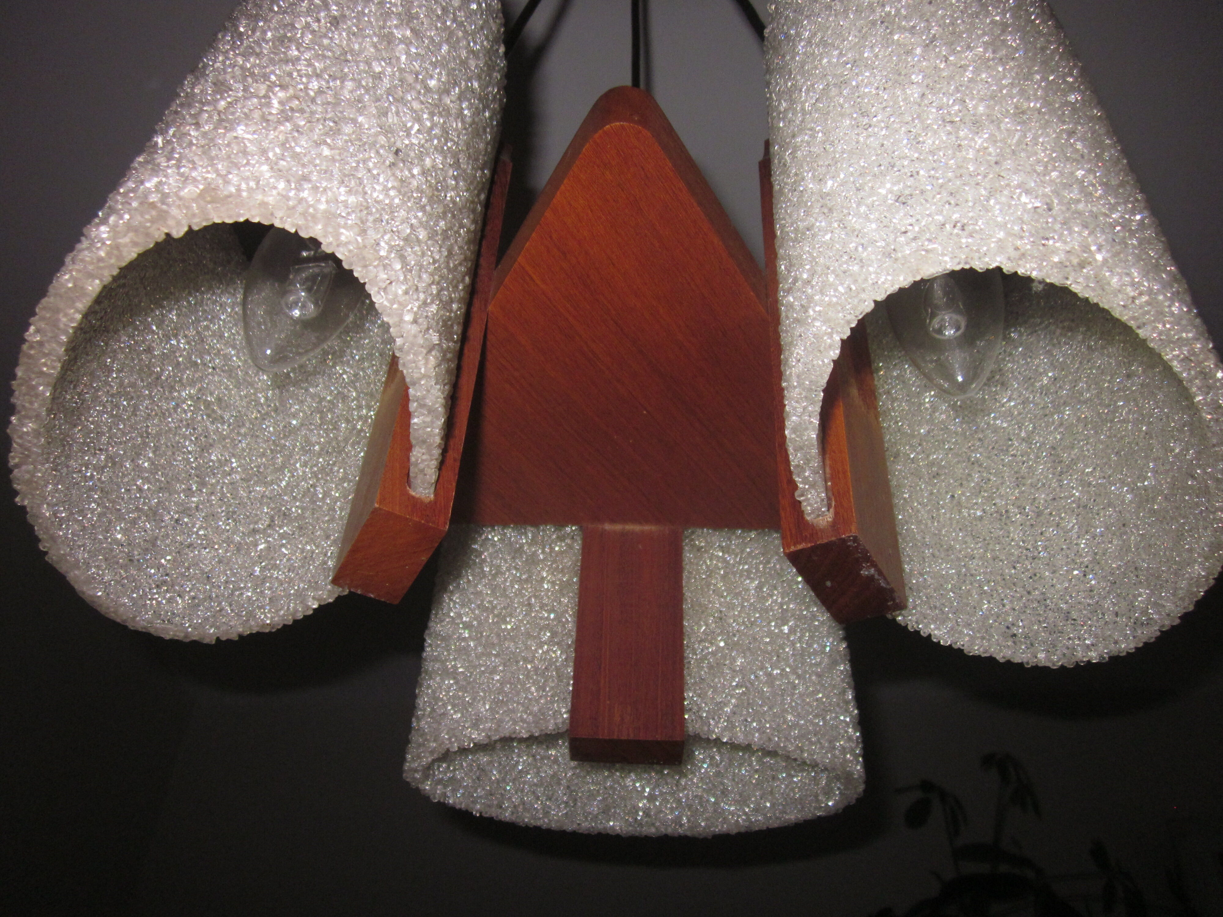 Scandinavian teak chandelier and perplexed