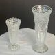 Set of two large, vintage, clear, molded glass vases on feet