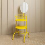 Yellow metal side table with swiveling oval mirror and two tray shelves, vintage 1960s Italy