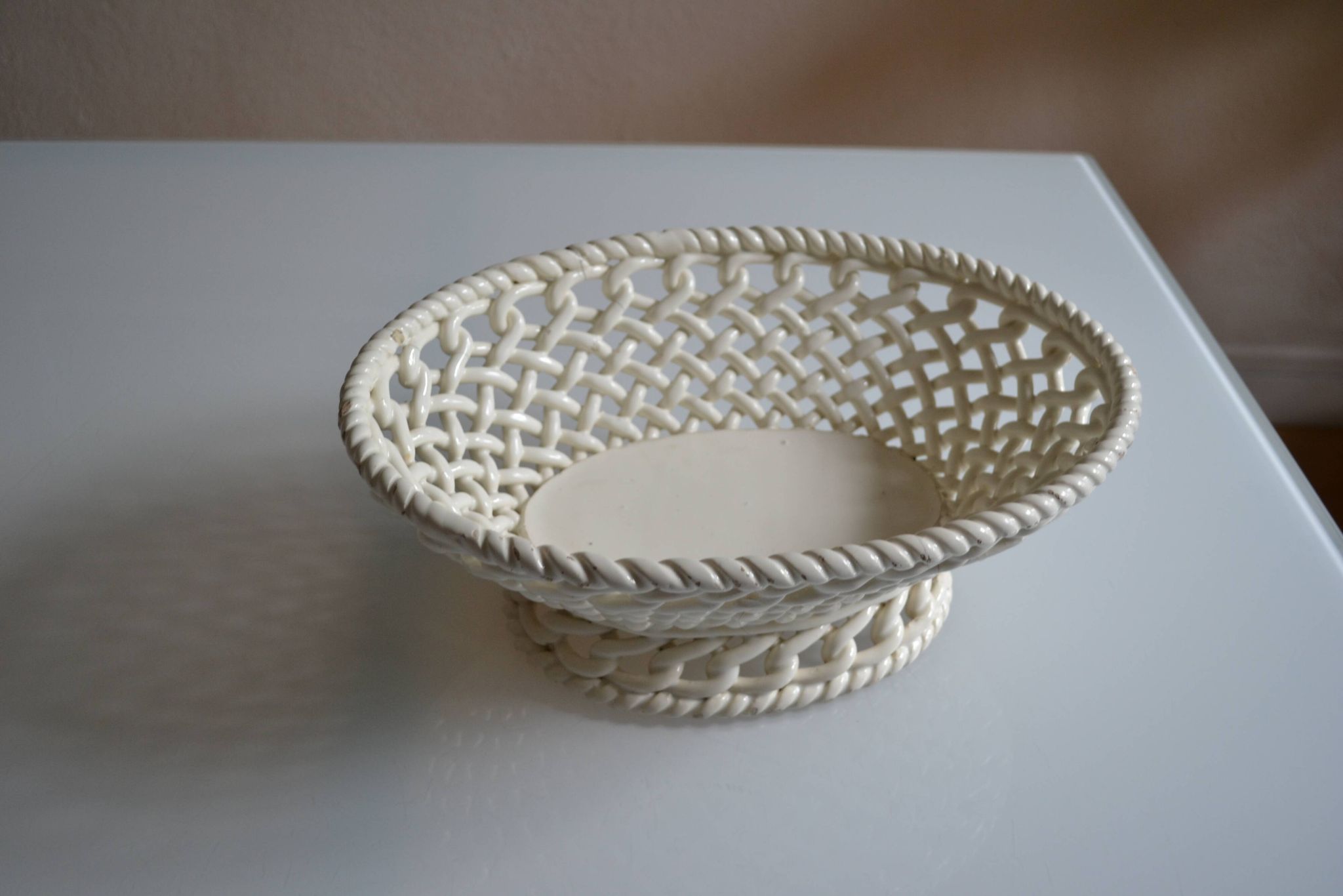 Woven ceramic oval fruit bowl or dish