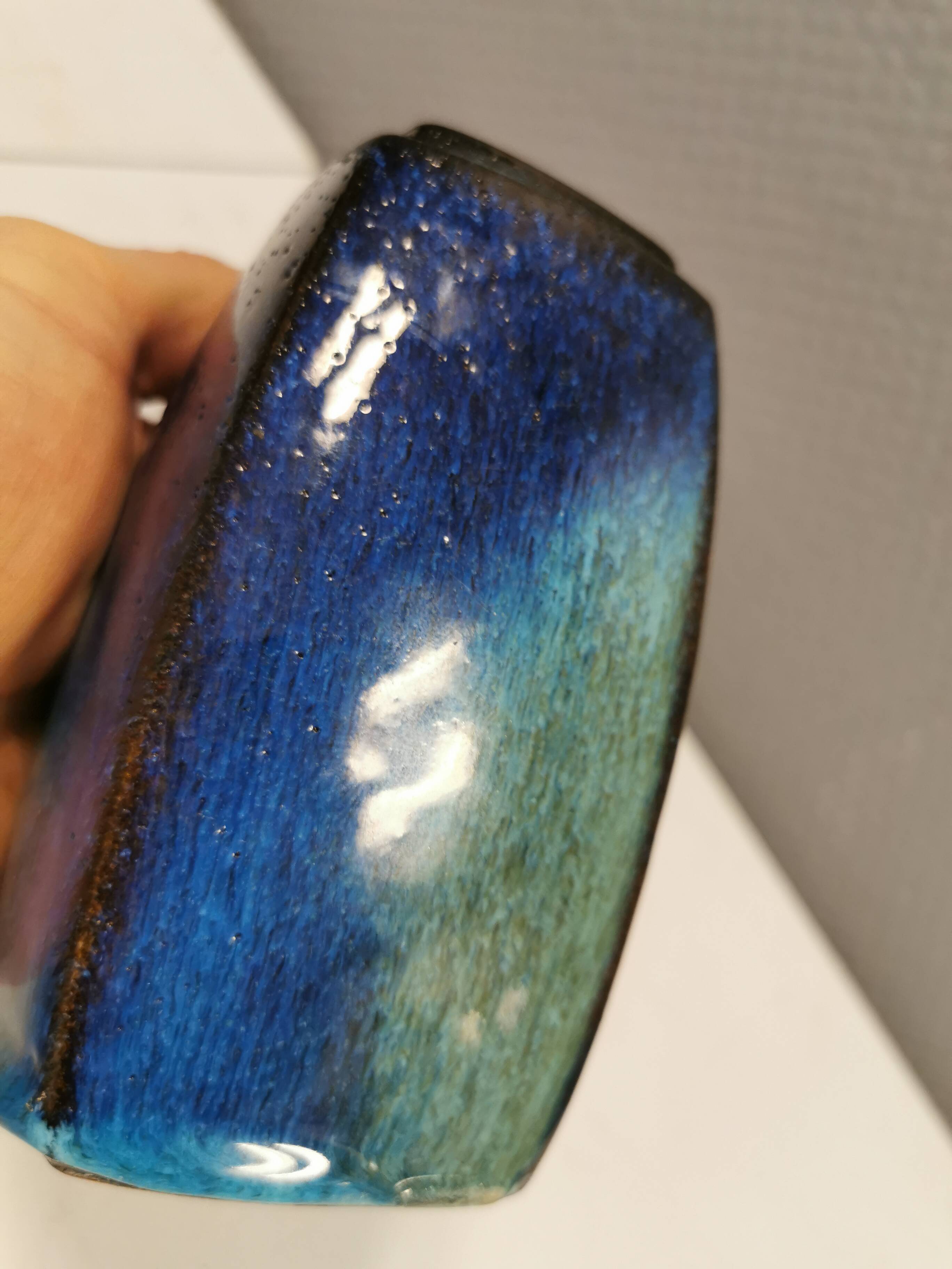 Vase in several shades of blue, from Danish Stogo art pottery. Estimated 1970-1980s