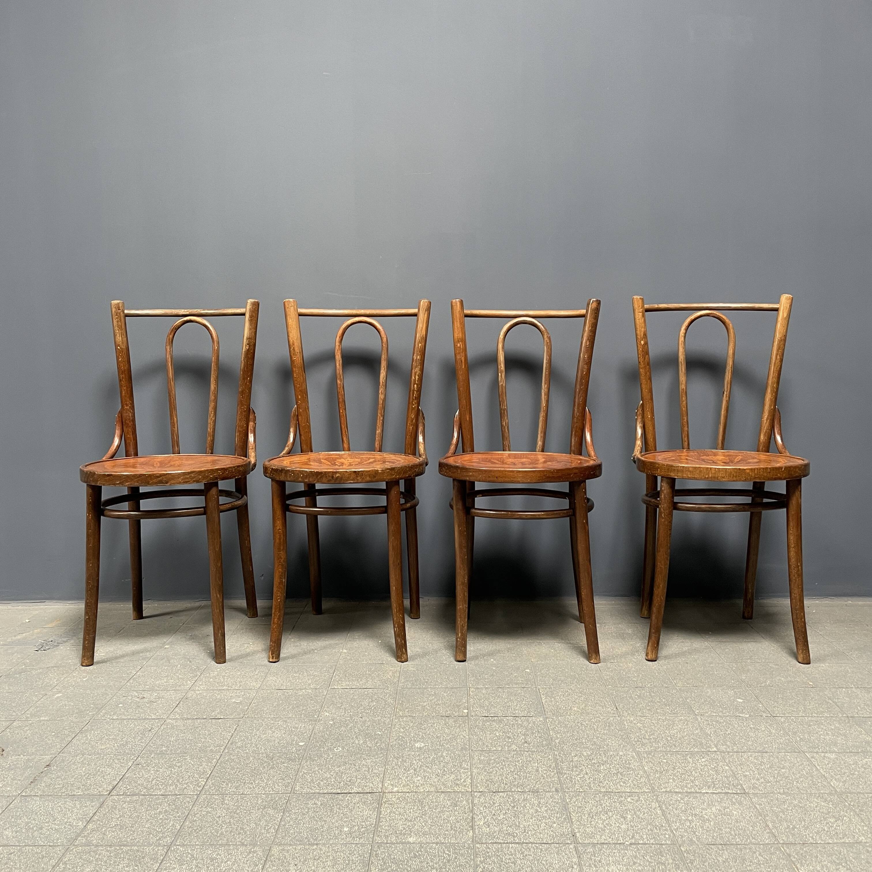 Set of 4 French Cafe Chairs with Graceful Seats