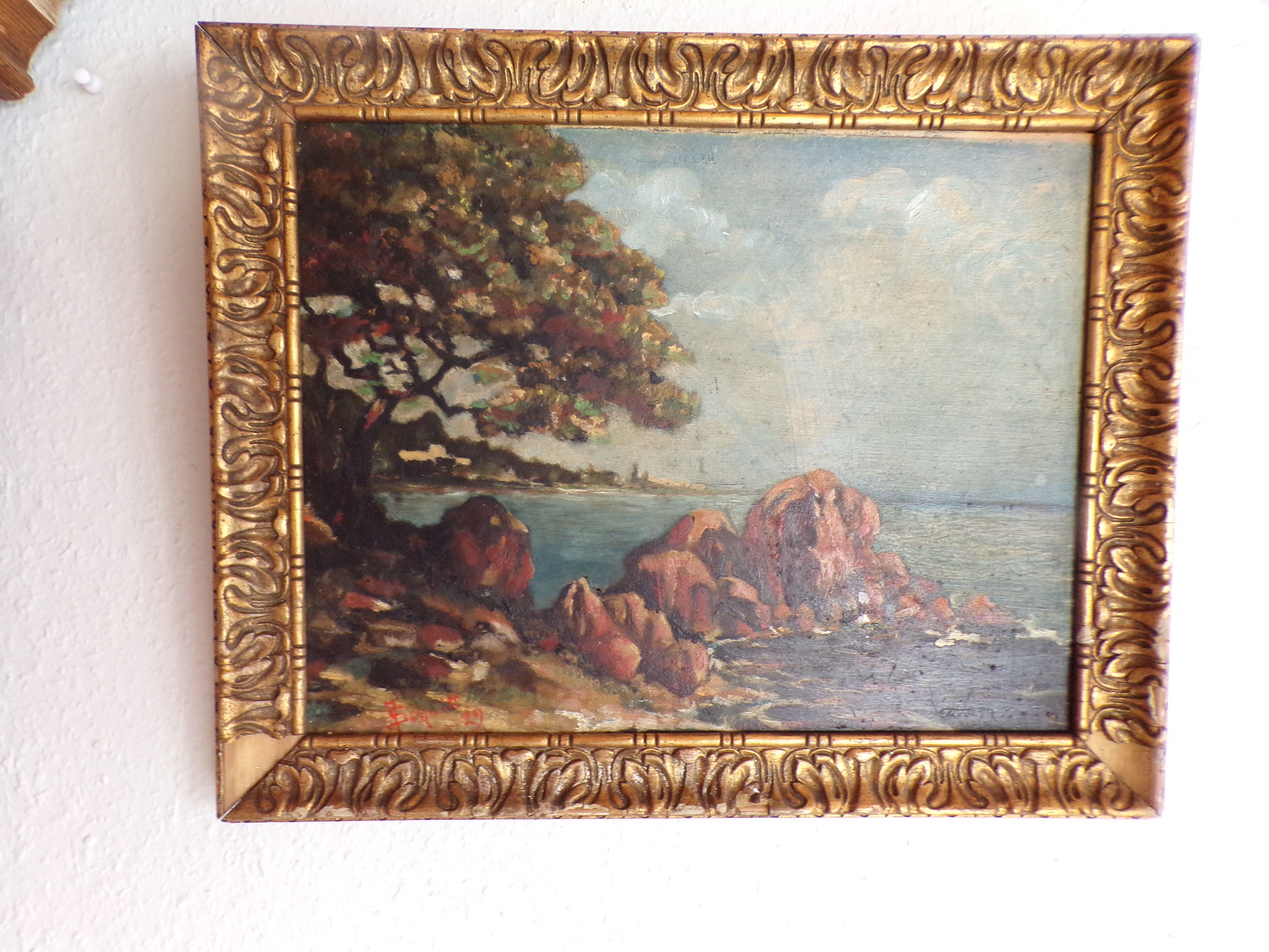 Signed seaside landscape painting dated 1929
