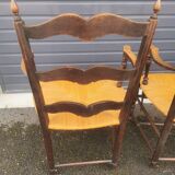 Pair of blackened wooden armchairs